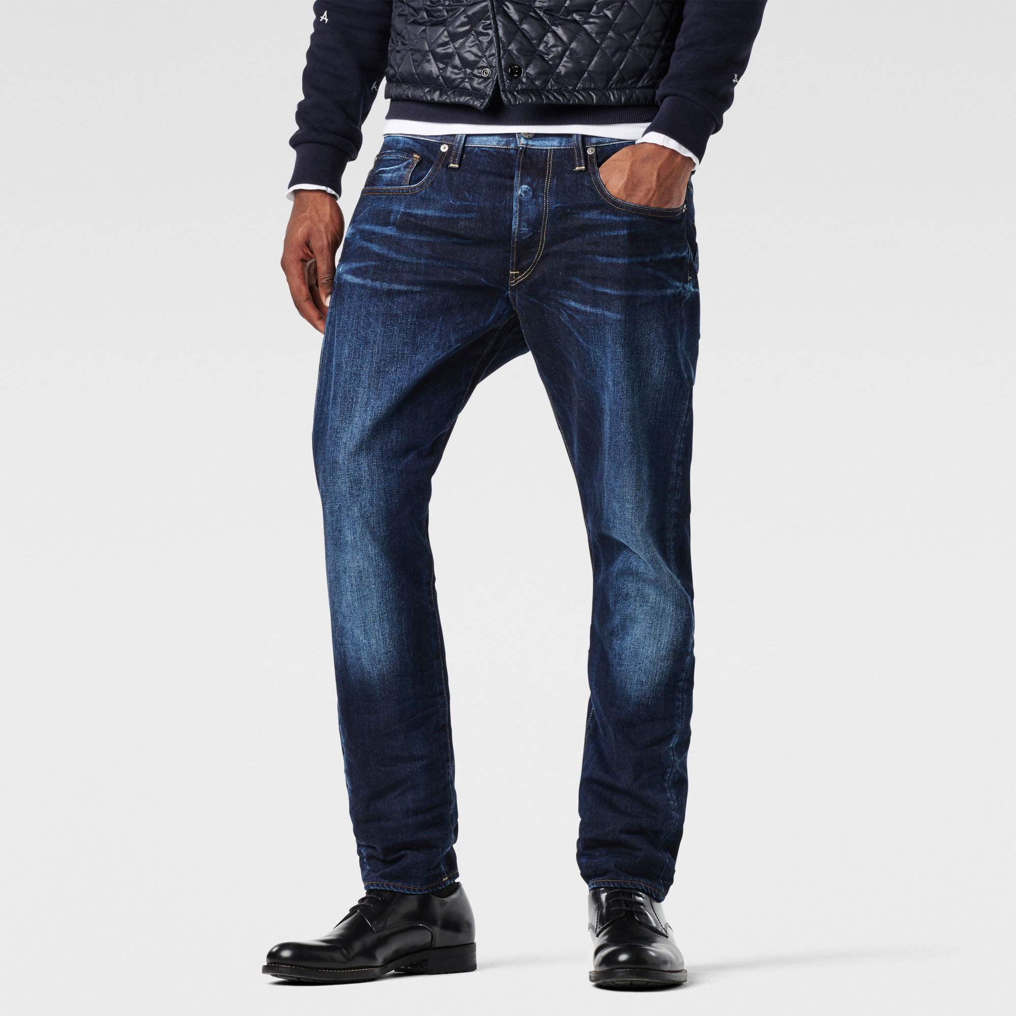 dark blue tapered jeans