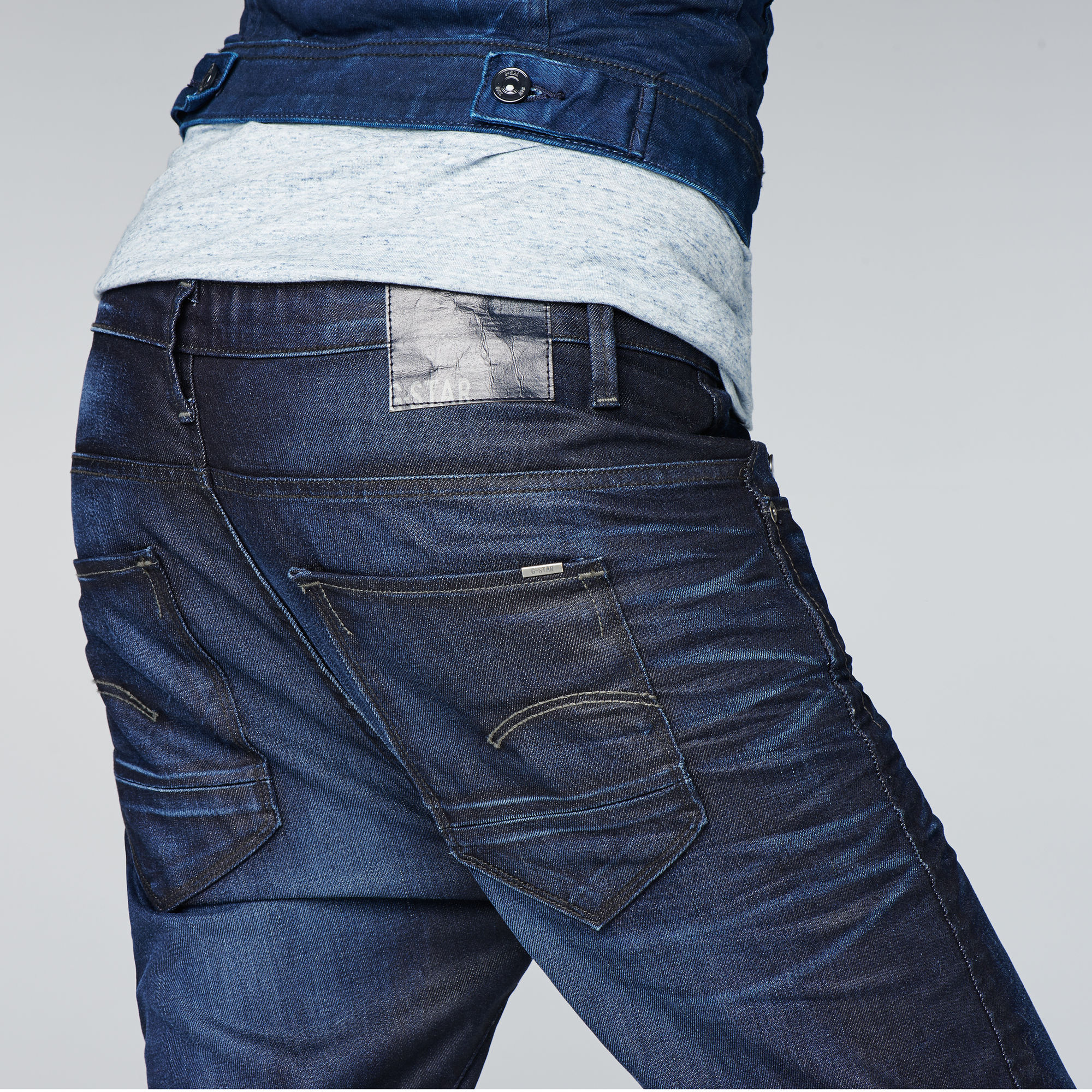 dark blue tapered jeans