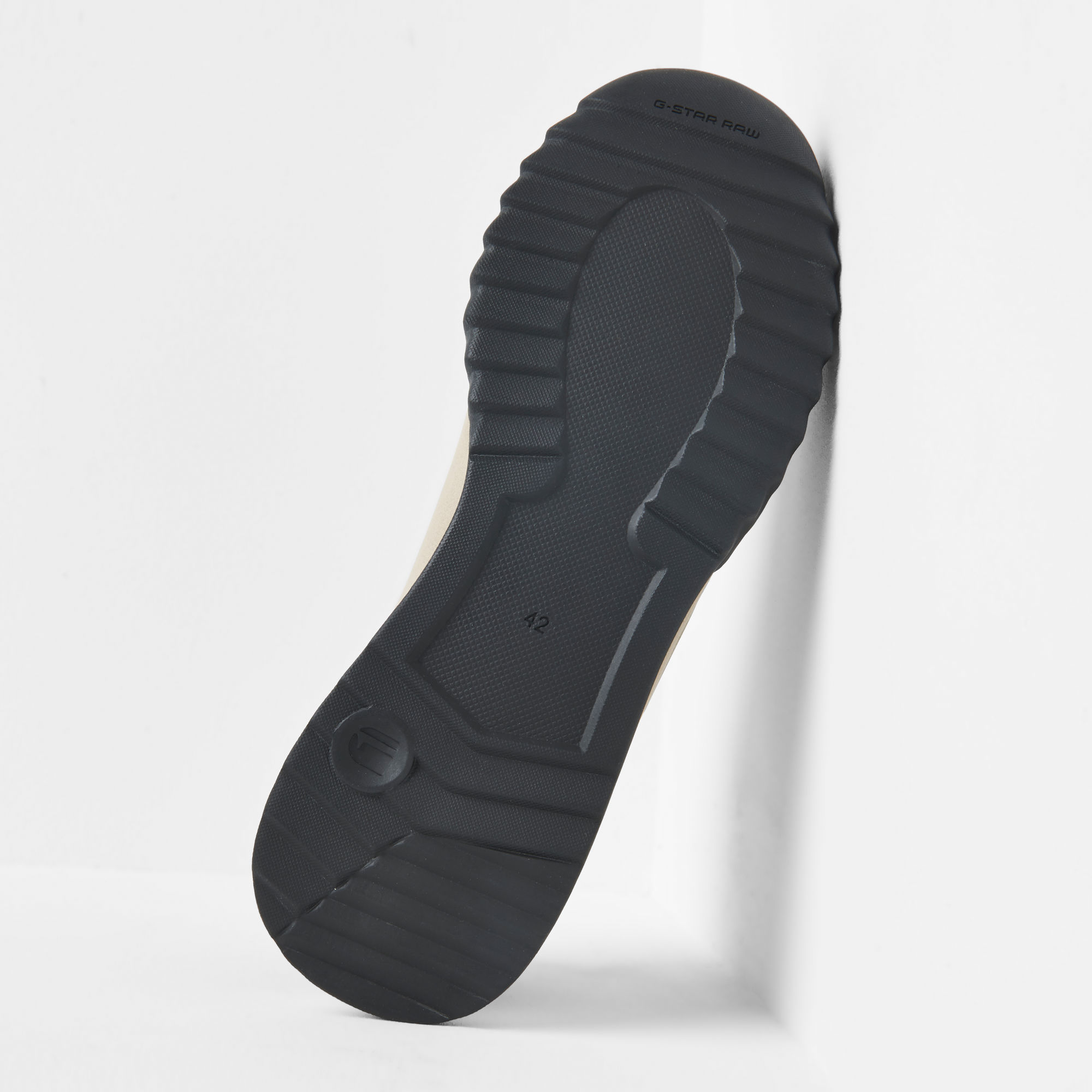 sneakers with brown sole
