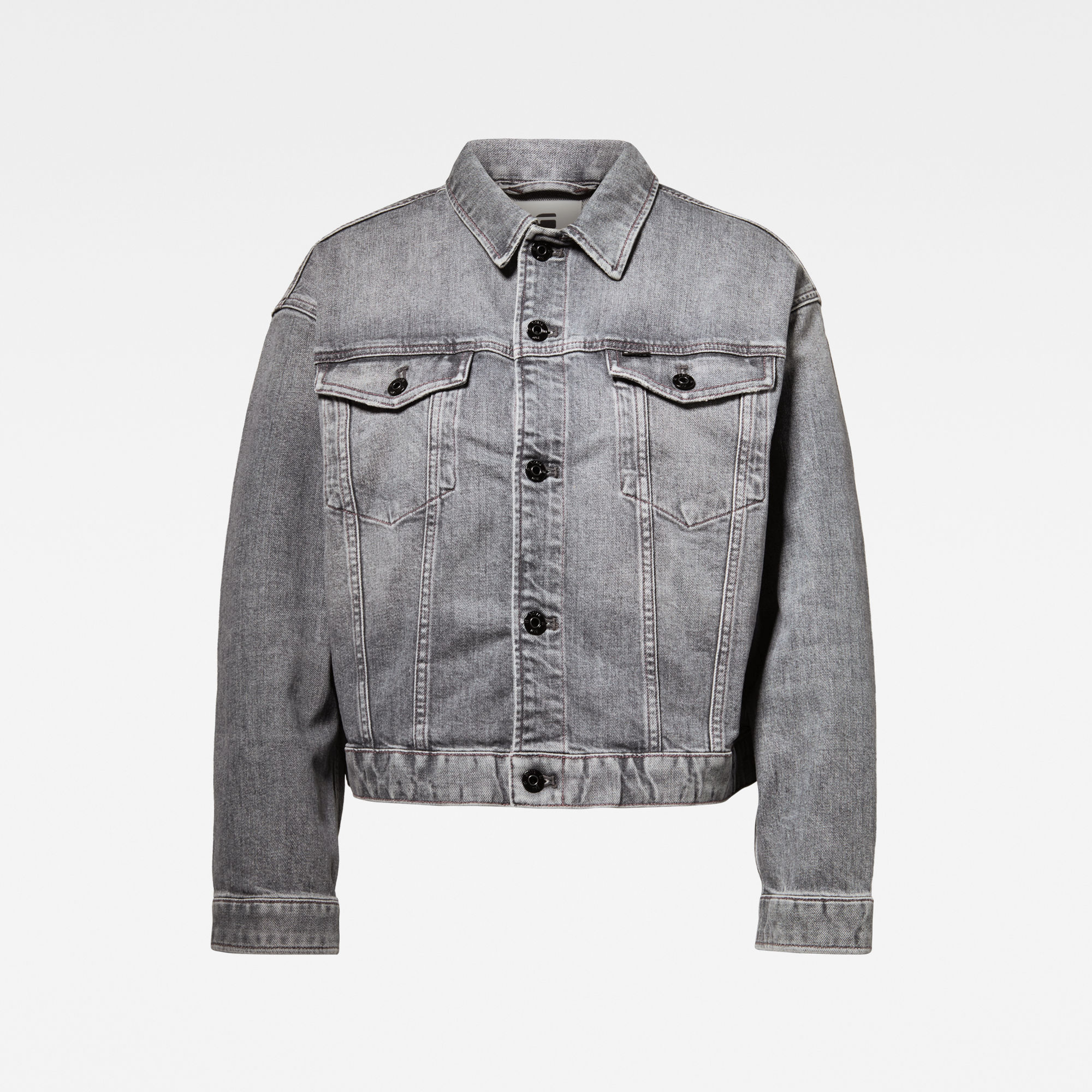 denim jacket and grey joggers