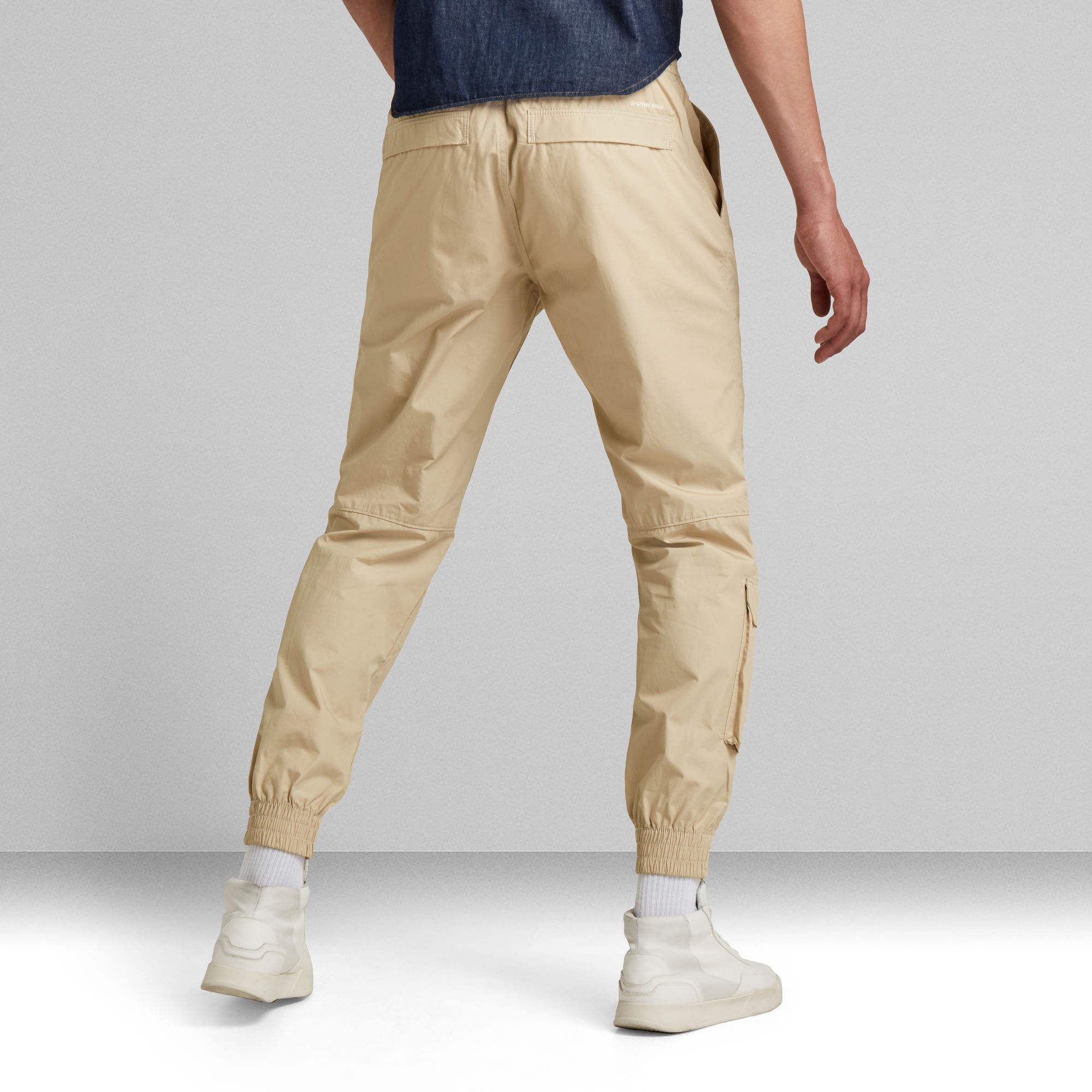 relaxed cuffed track pants with fringes and 3 stripes tape