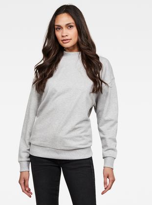 gray sweater with white collar