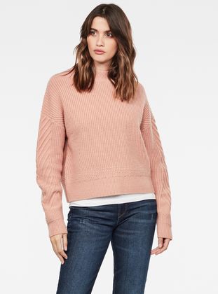 pink turtleneck sweatshirt