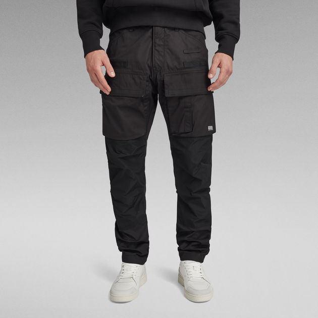 ASOS DESIGN tapered cargo pants in black with toggles | ASOS
