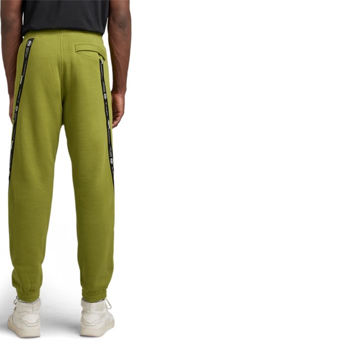 Green tape logo track pants discount