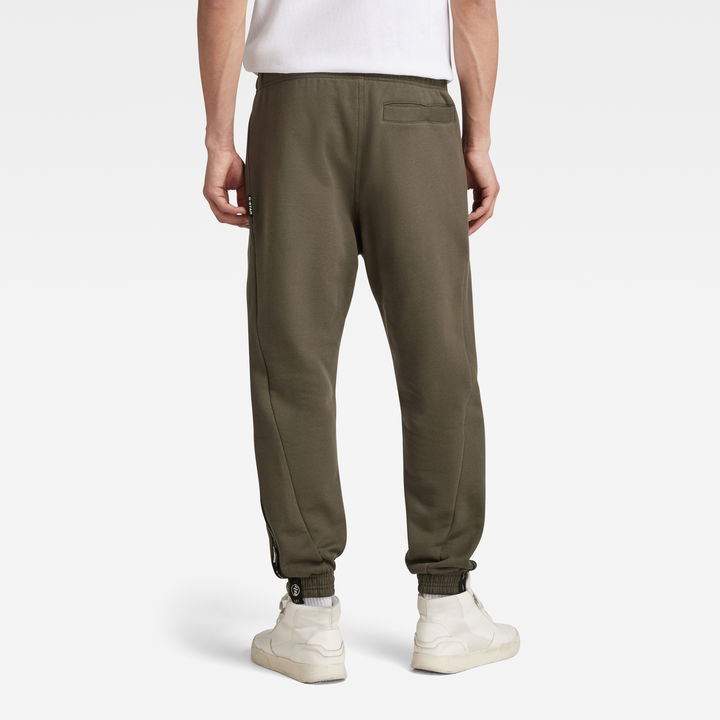 Green tape logo track pants online