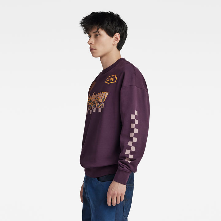 Purple graphic sweater online