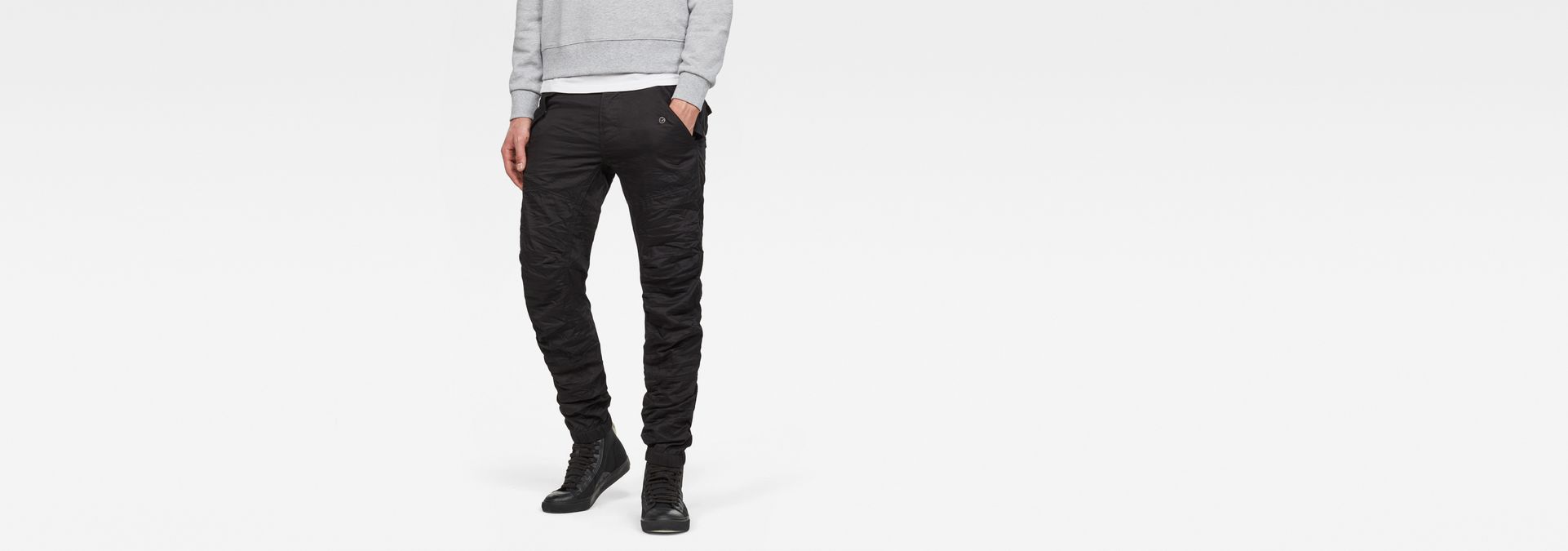 rovic deconstructed tapered cuffed jeans